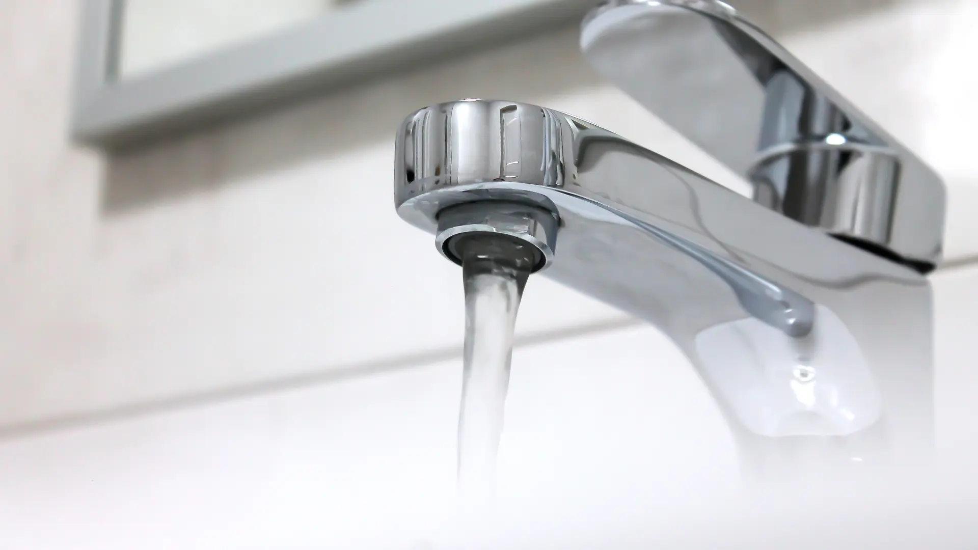 A tap showing a good water pressure after low water pressure detected